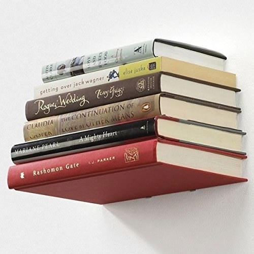 Floating shelves with books on them