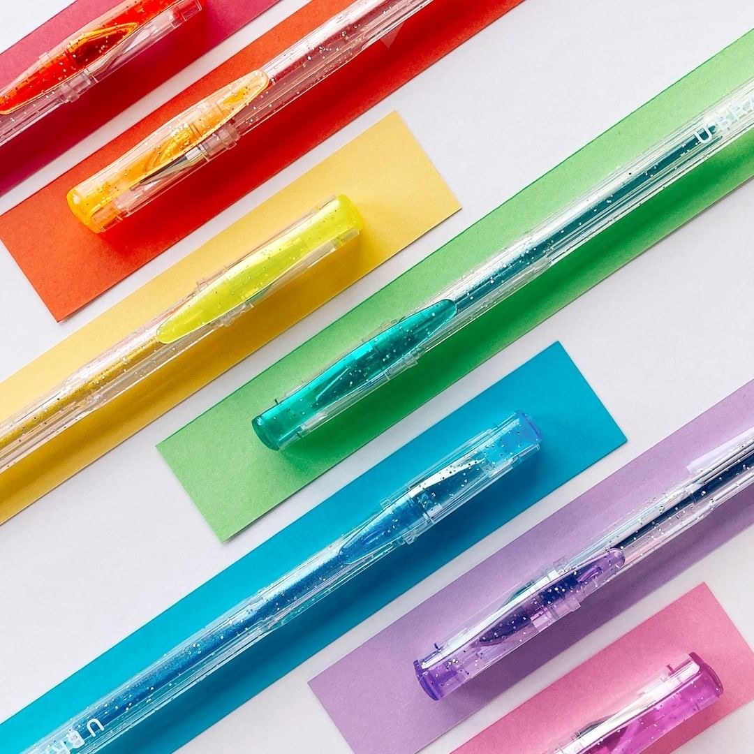A flatlay of colourful glitter gel pens