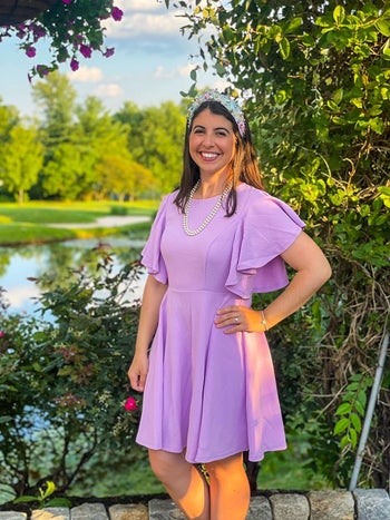 reviewer wearing the dress in lilac