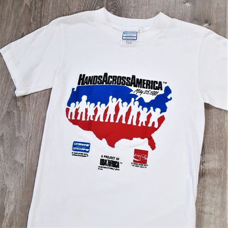 A achromatic Hands Across America T-shirt