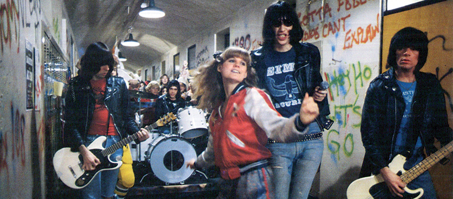 The Ramones playing in a hallway in the film Rock &#x27;n&#x27; Roll High School. 