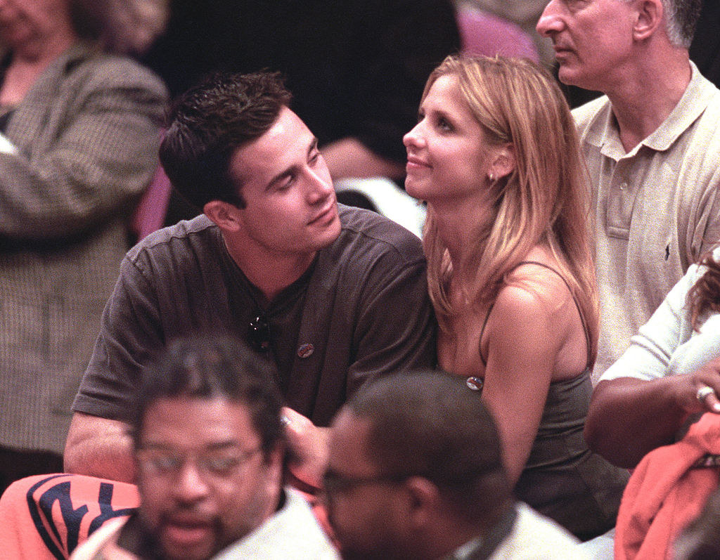 with SMG at a bball game