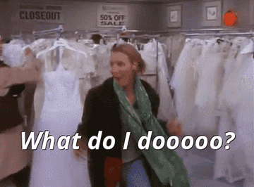 Gif of Phoebe from Friends at a wedding dress sample sale panickedly shouting, &quot;what should I do?&quot;