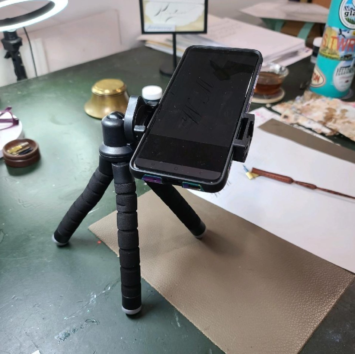 the reviewer&#x27;s image of the phone tripod in black