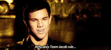 Taylor Lautner smiles big and says &quot;Why does Team Jacob rule&quot; during an interview promoting the Twilight saga films