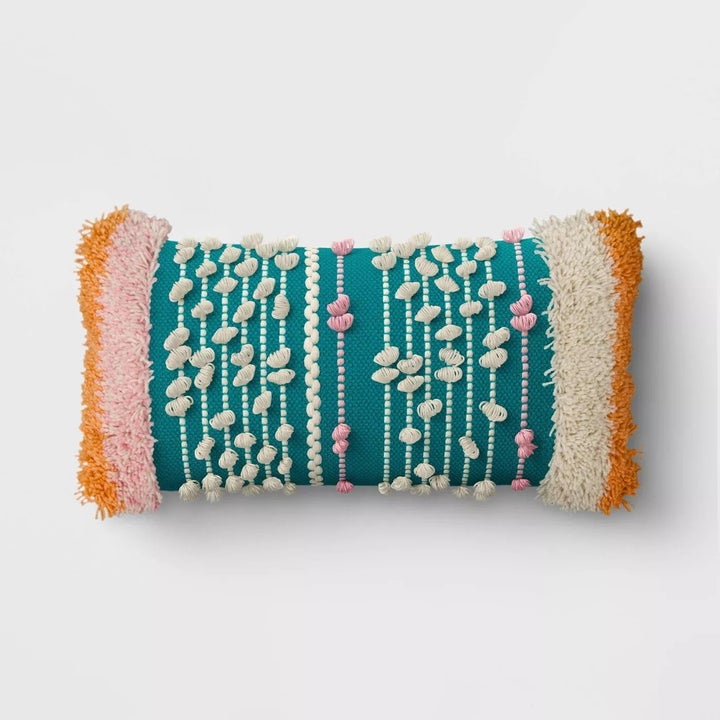 colorful textured pillow in rectangular shape 