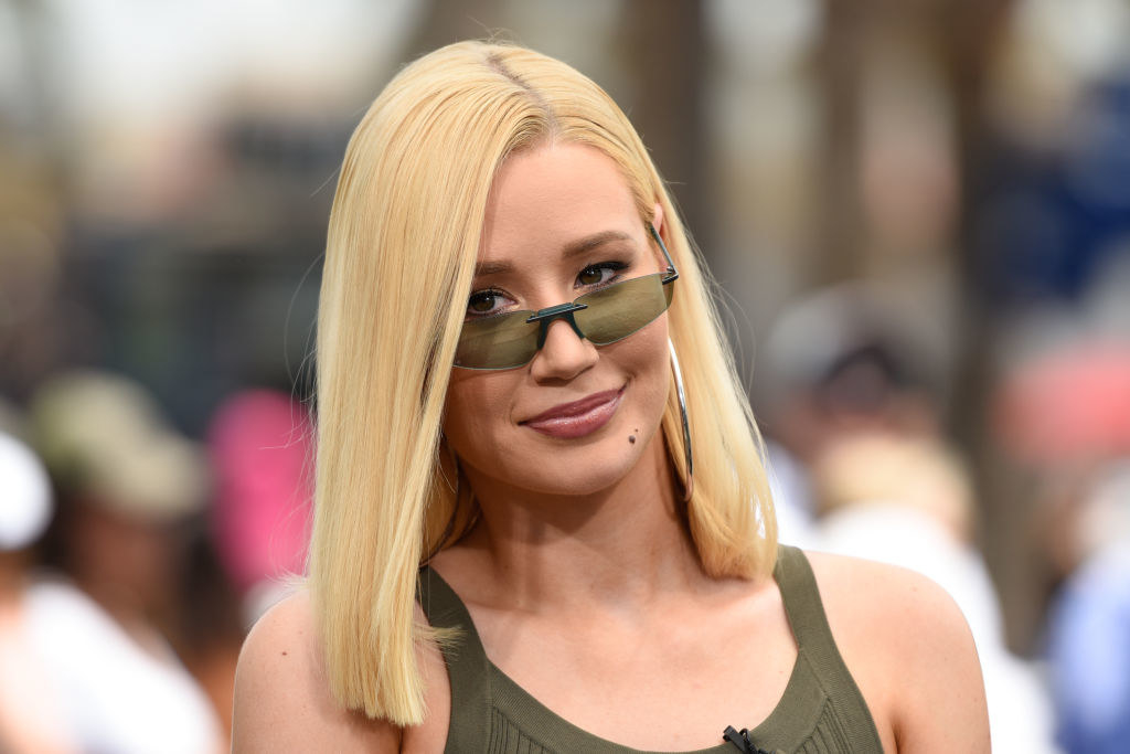 Iggy wearing sunglasses and smiling