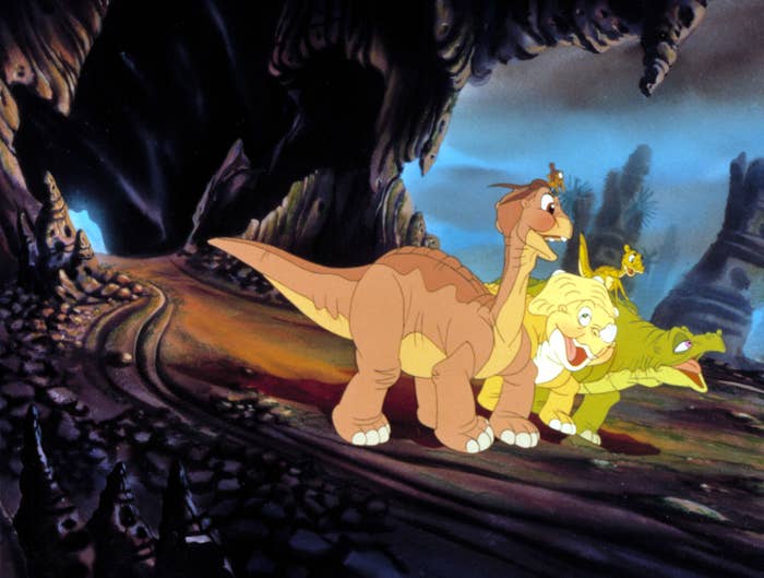 Little Foot, Ducky, Petrie, Spike, and Cera going on a journey through an jurassic world