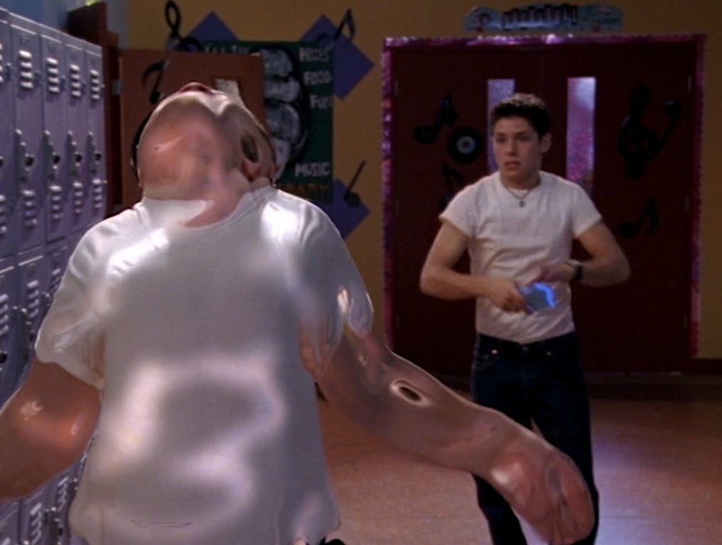 Ricky Ullman stuns a fellow student in the hall of his high school