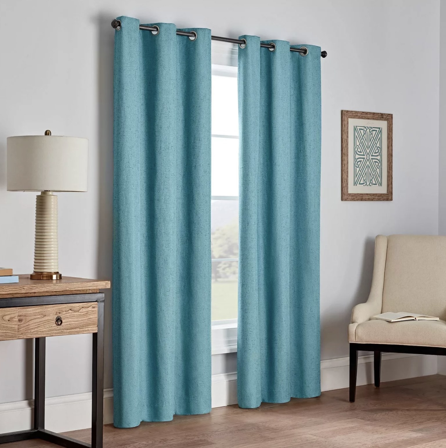 The blackout curtains in a pretty blue color