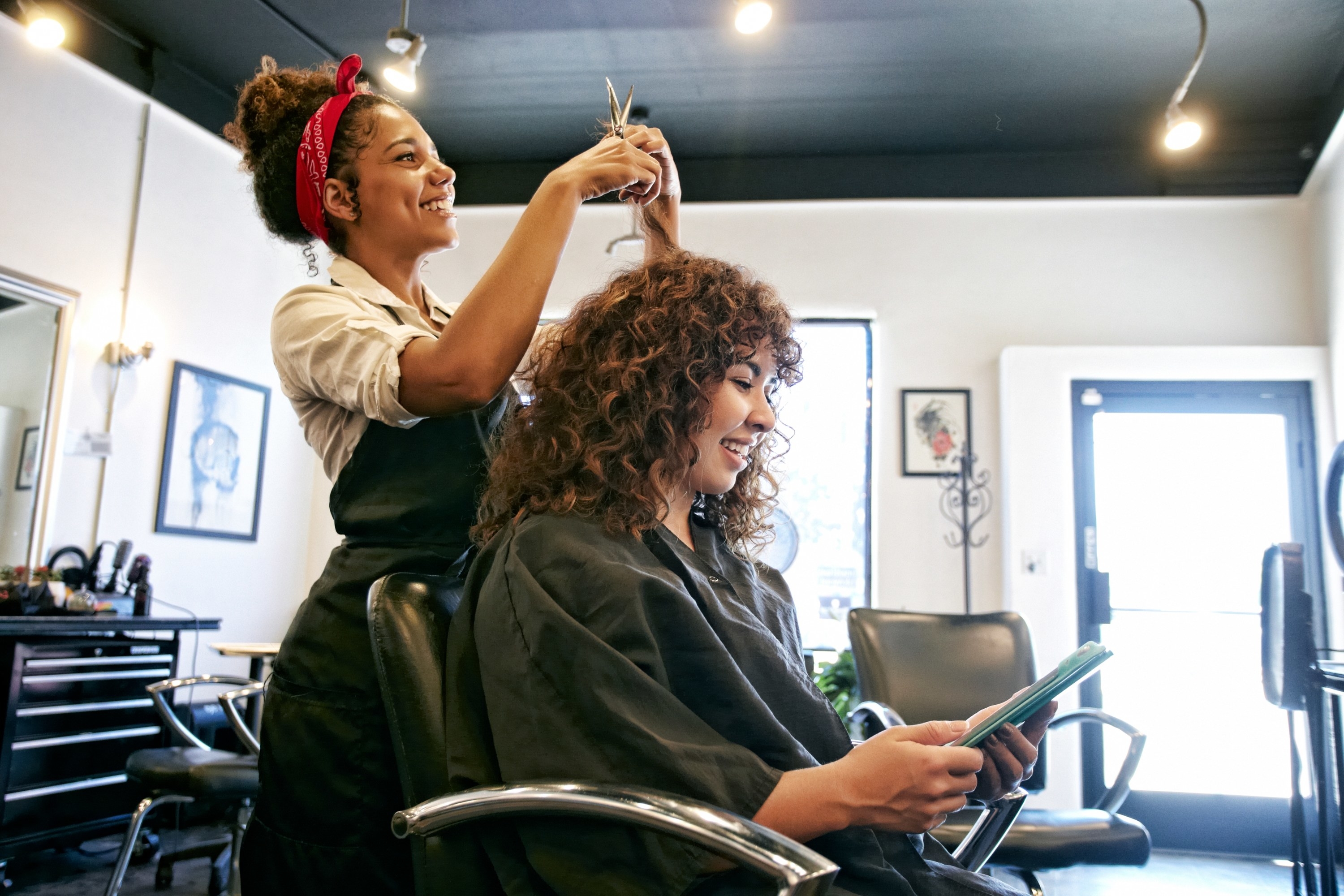 Woman gets a haircut in salon