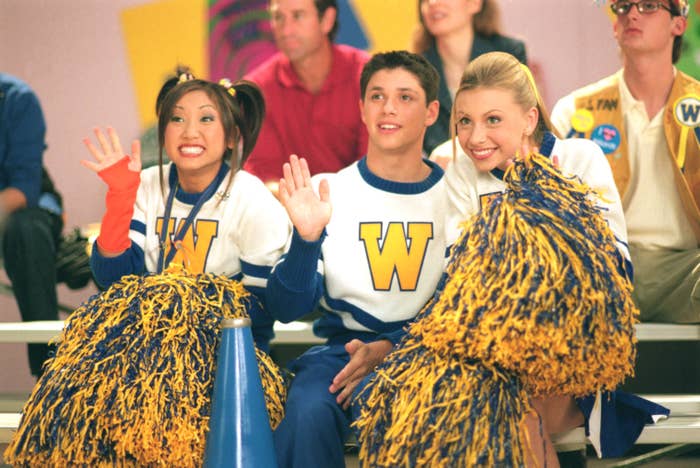 Brenda Song, Ricky Ullman, and Aly Michalka in cheerleading attire