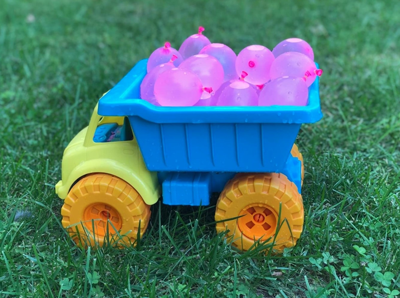a reviewer&#x27;s image of water balloon in a little toy truck