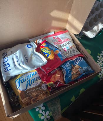 Reviewer photo of the assorted snacks inside the CraveBox