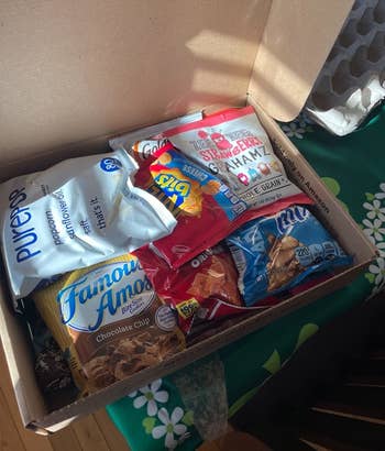 Reviewer photo of the assorted snacks inside the CraveBox