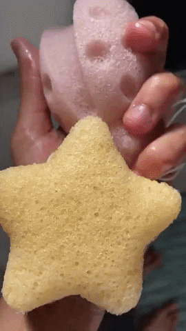 Reviewer's video showing them squeezing the konjac bath sponges