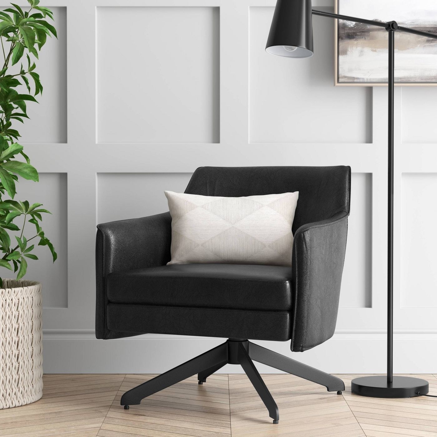 The chair with a pillow on top.