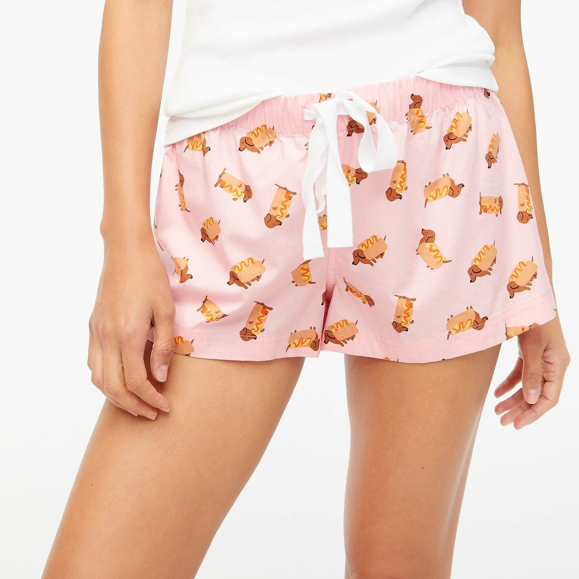 Model wearing the pink hot dog cotton sleep shorts