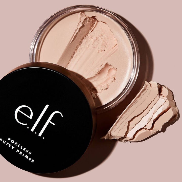 An open jar of makeup poreless putty primer