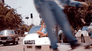 Ariana Grande gif from the Baby I music video 
