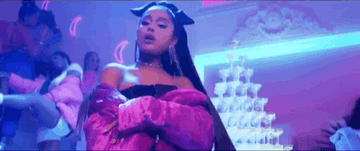 Ariana Grande gif from the 7 rings music video 