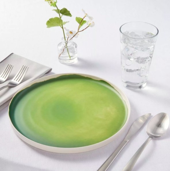 Green plate on table