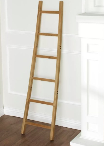 Wooden ladder on wall