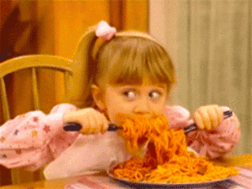 One of the olsen twins from full house eating a lot of spaghetti