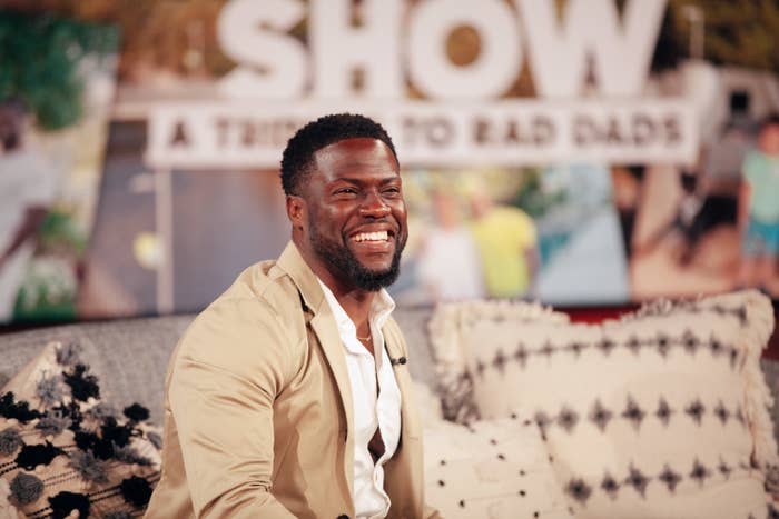 Kevin Hart is pictured smiling during an appearance on The Kelly Clarkson Show