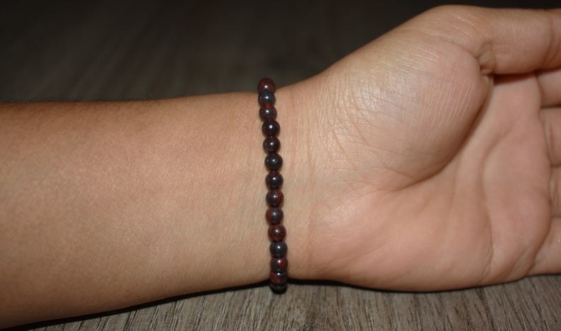 A person wearing the bracelet