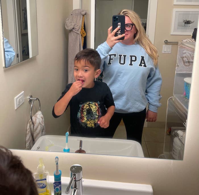 The author wearing the FUPA sweatshirt in blue