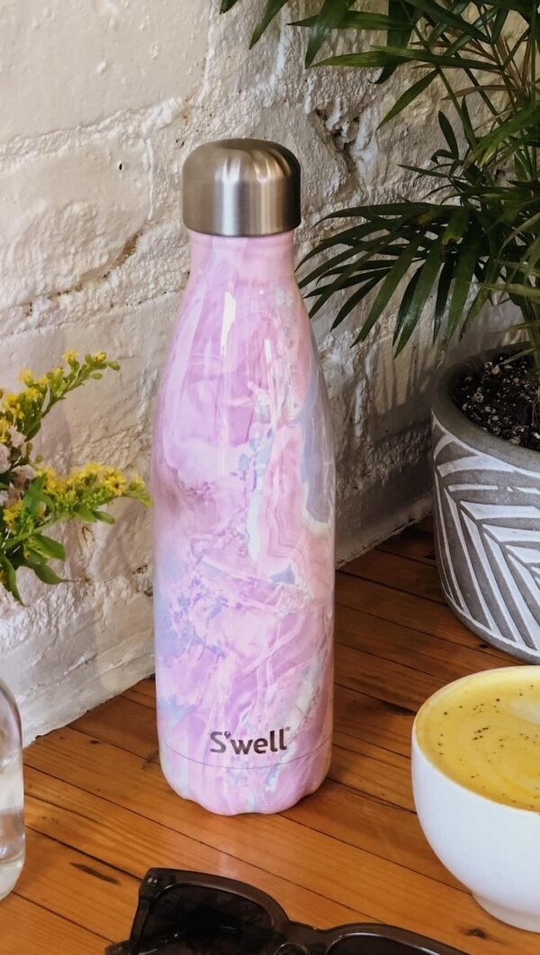 The Geode Rose Bottle on a counter