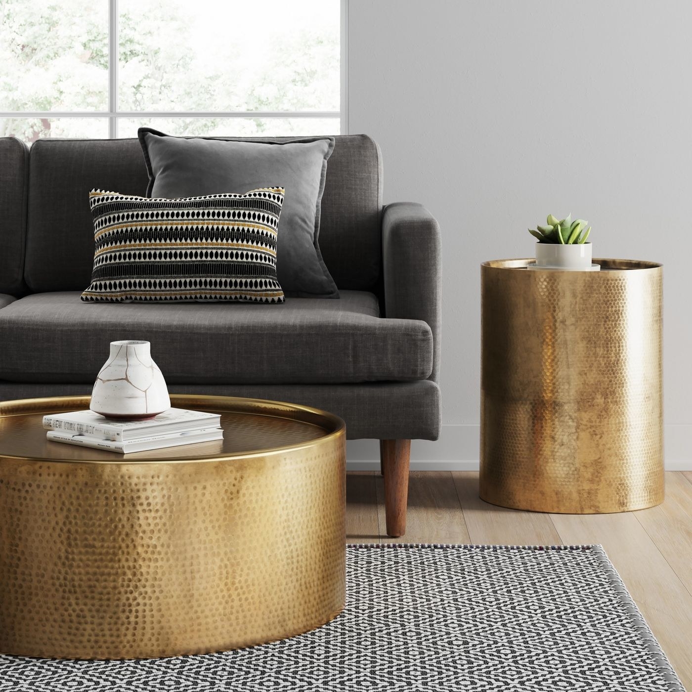 Accent table in a room with a matching coffee table and a couch