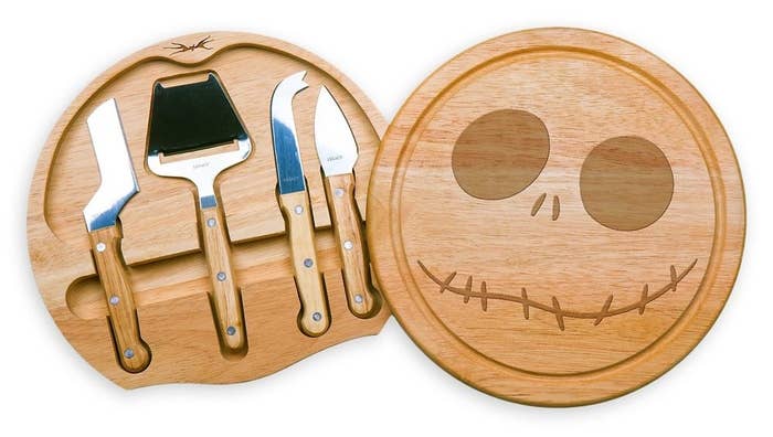 The cheese board, open, showing tools within