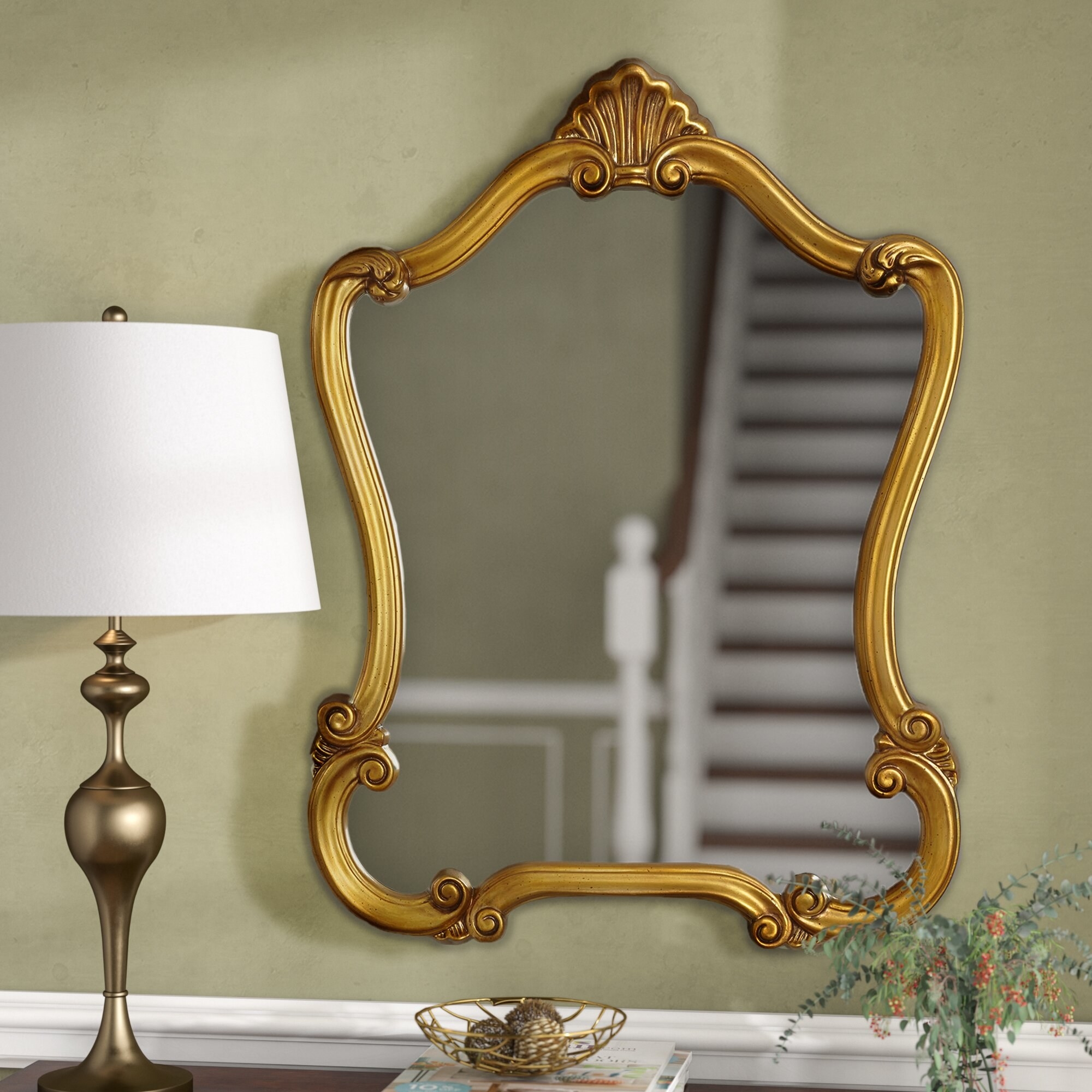 The accent mirror in gold