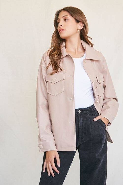 model wearing the taupe shacket with pockets on each side of the chest