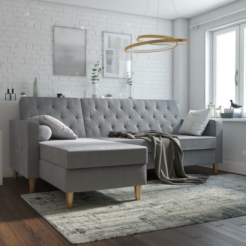 the sofa in light gray 100% polyester in a living room