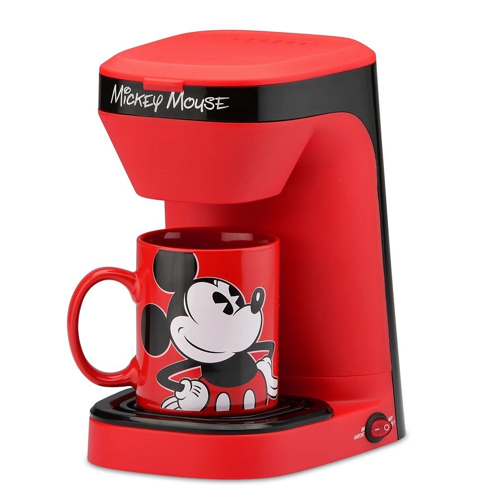 The red and black appliance with matching mug