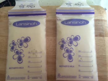 Reviewer's photo showing the breastmilk storage bags with write-on labels