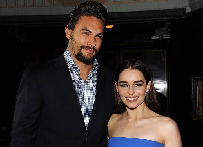 Jason and Emilia stand together, smiling