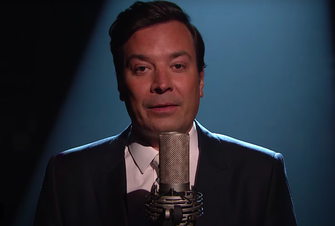 Jimmy Fallon at a microphone