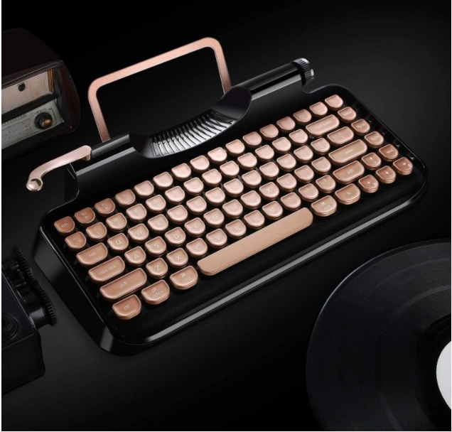 Foto de teclado vintage para compuradoras en color negro y cobre