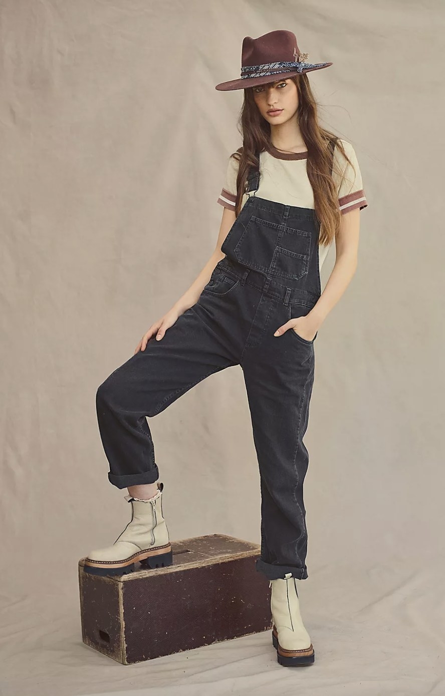 the overalls in mineral black with white boots and a t-shirt underneath