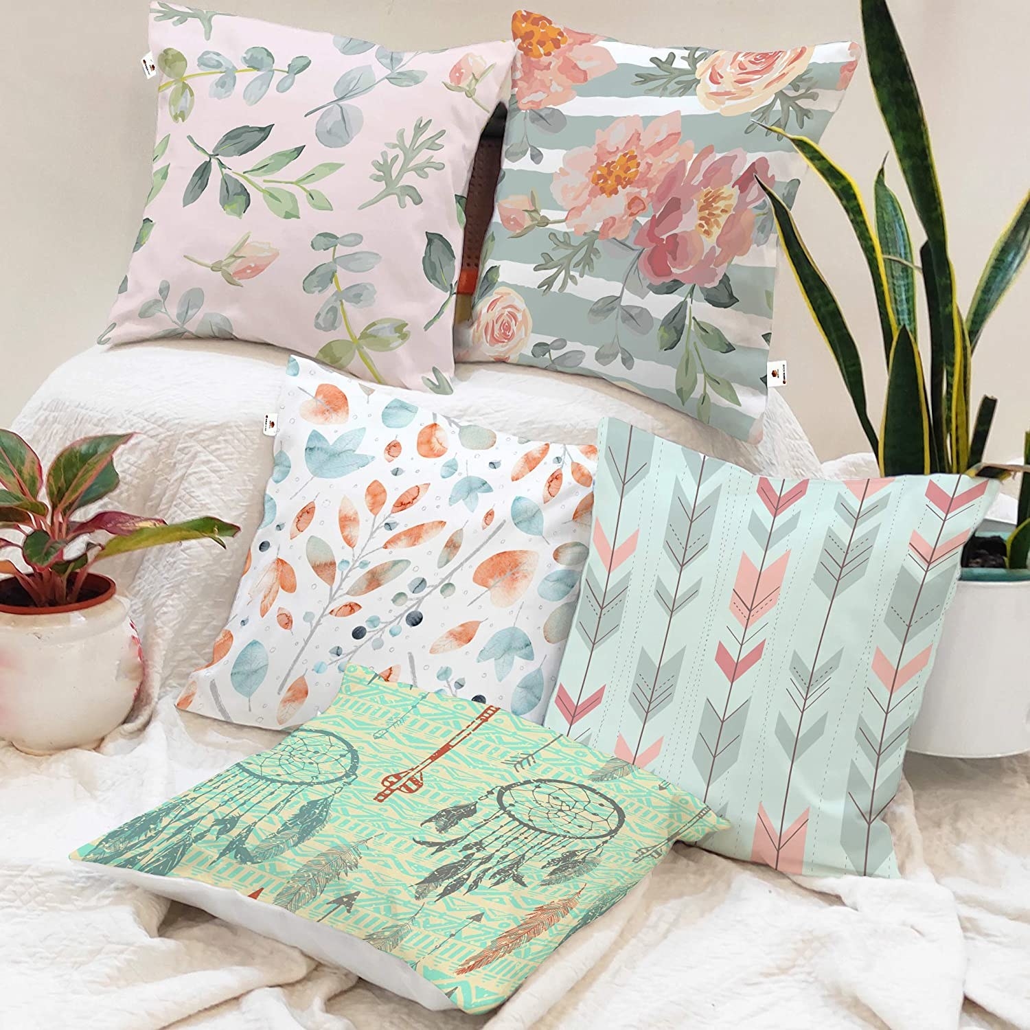 5 cushion covers with patterned with geometric prints, flowers, dreamcatchers, and leaves