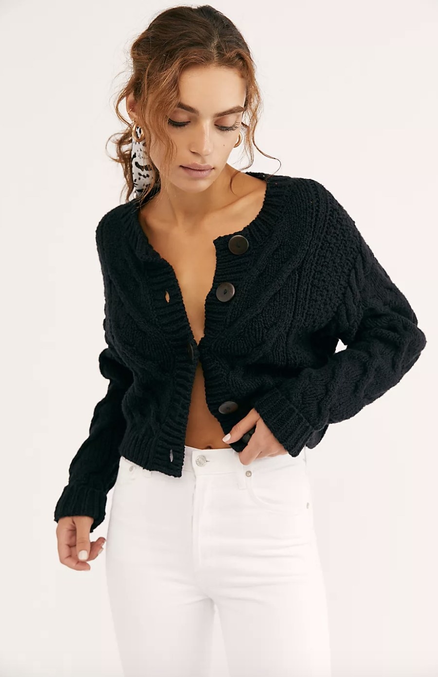 the cardigan in black paired with white jeans