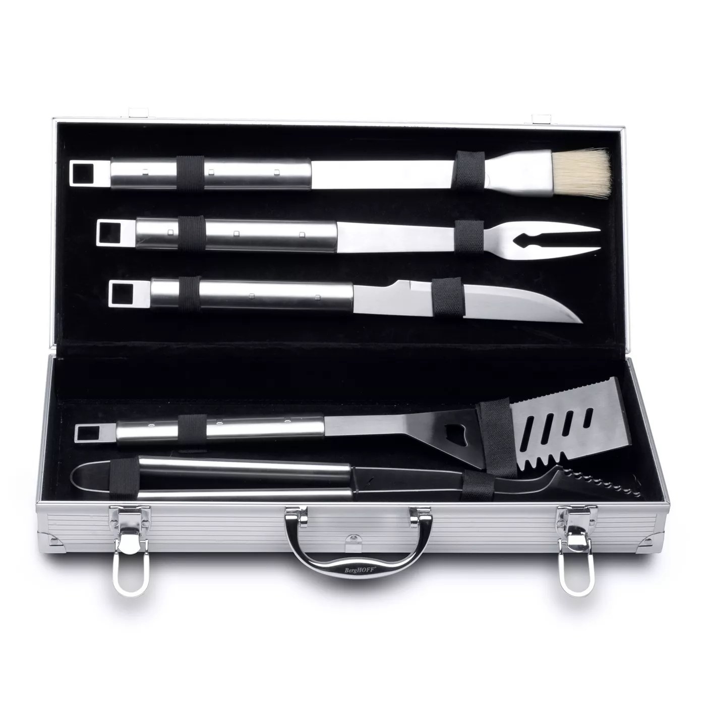 The small brush, barbecue knife, slotted turner, meat fork, tongs, and aluminum carving case