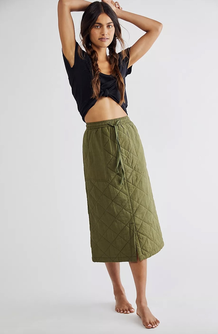 the quilted skirt in a khaki green color