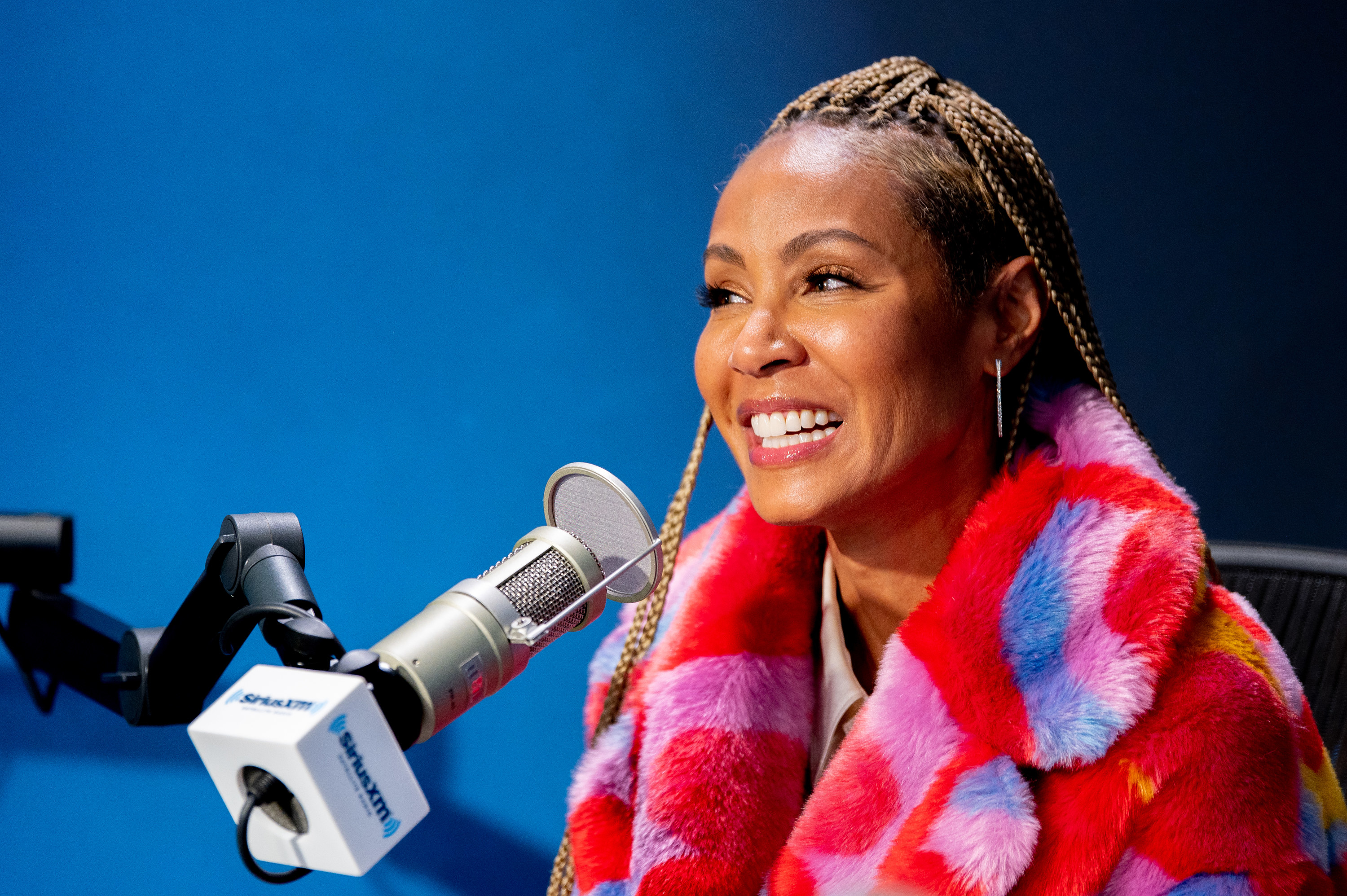 Jada Pinkett Smith speaks into a microphone at SiriusXM Studios in November of 2019