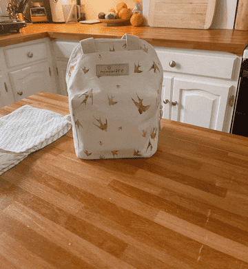 A gif of a lunchbox with containers and snacks