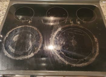 a reviewer's stovetop looking dirty